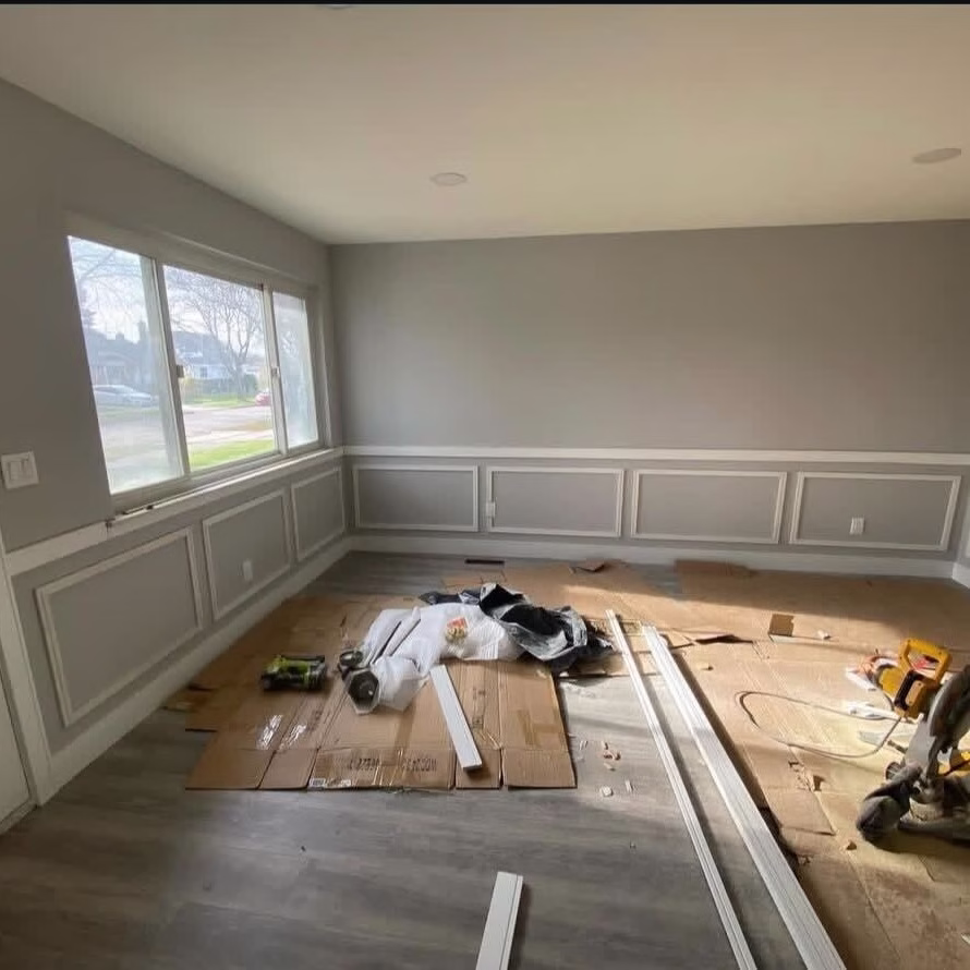 Room with new wainscoting during an interior renovation