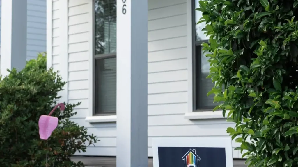 White painted exterior siding and porch column