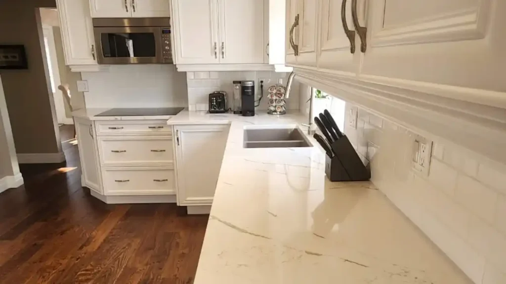 White kitchen cabinets with quartz countertops